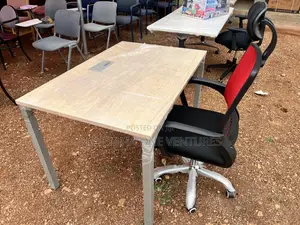 Uk Used Adjustable Table and a Chair