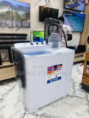 Sleek Slim Washing Machine 12kg Topload Pearl White.