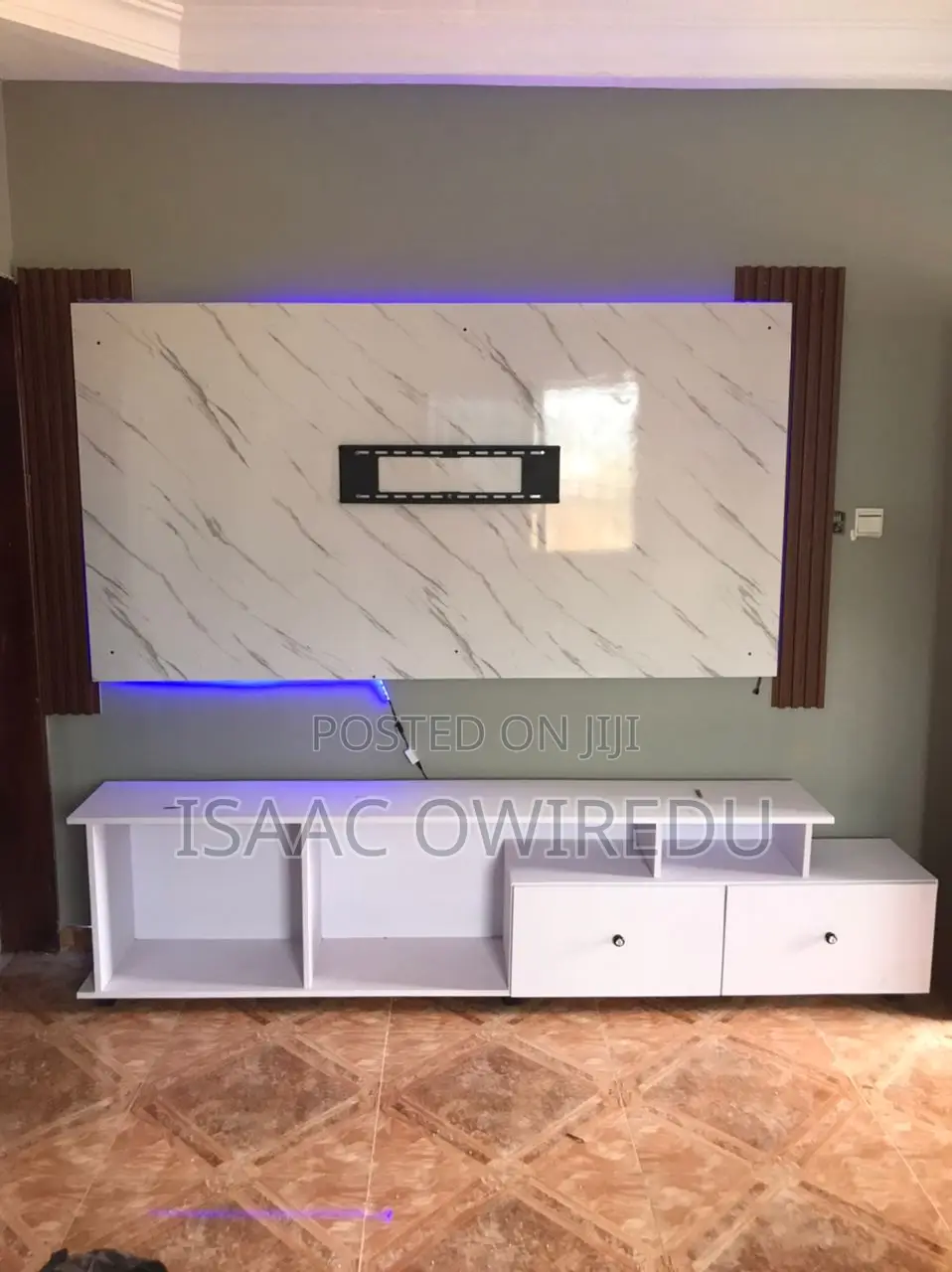 A Television Wall Mount With Base