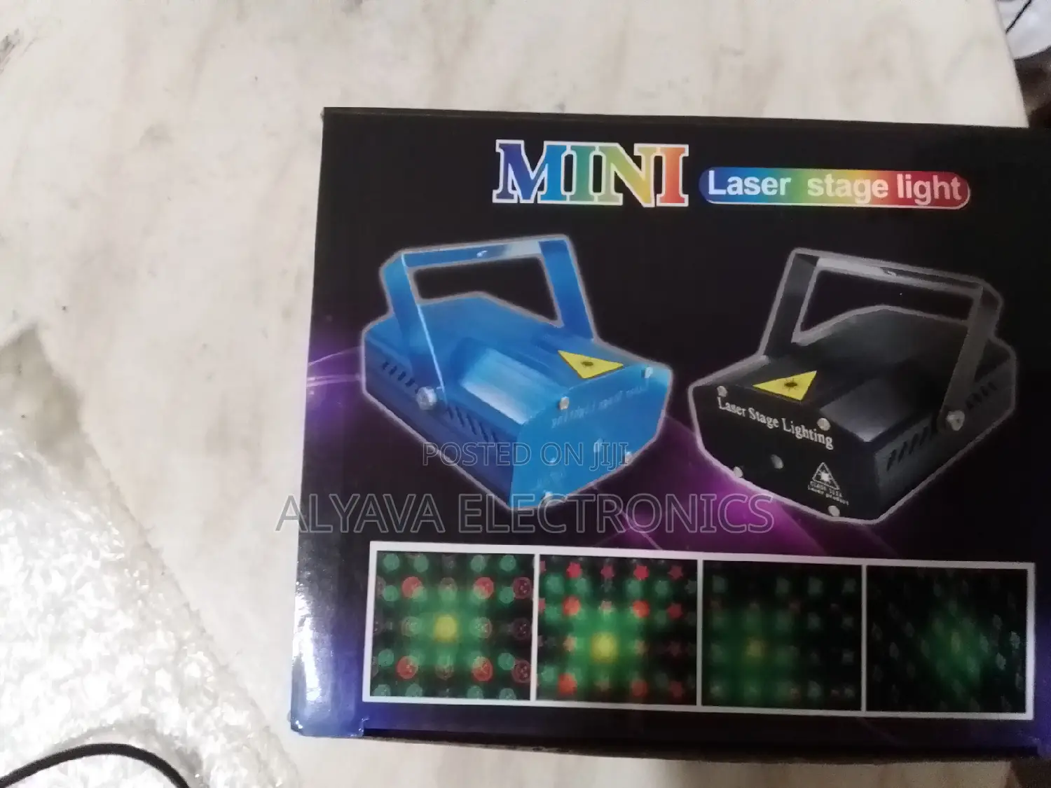 Mini Laser Stage Light ( Sound Motion)