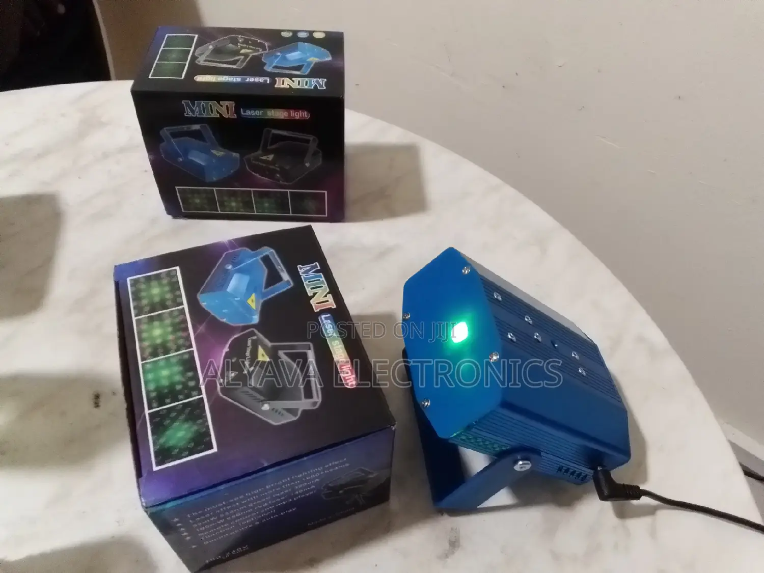 Mini Laser Stage Light ( Sound Motion)