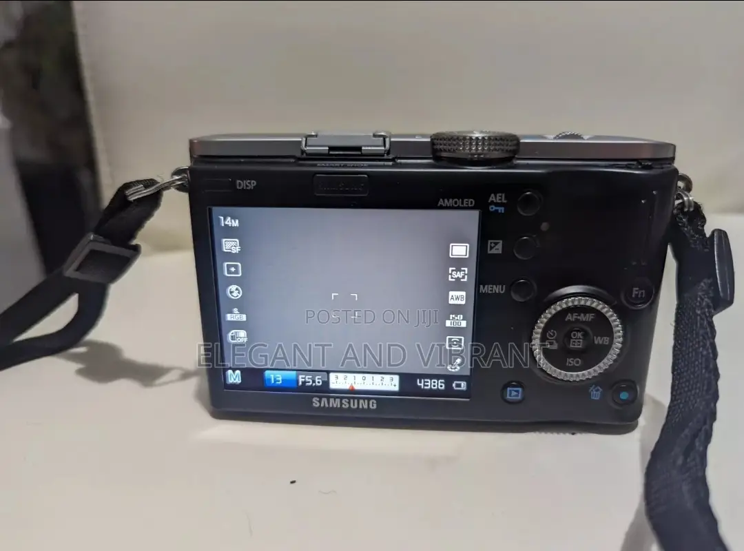 Samsung Nx100 Camera With 20-50mm Lens+ Pentacon 2.8 135mm
