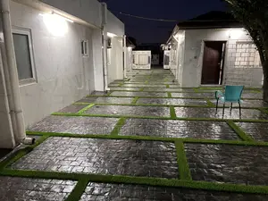 Cobbles Stamped Concrete With Astroturf