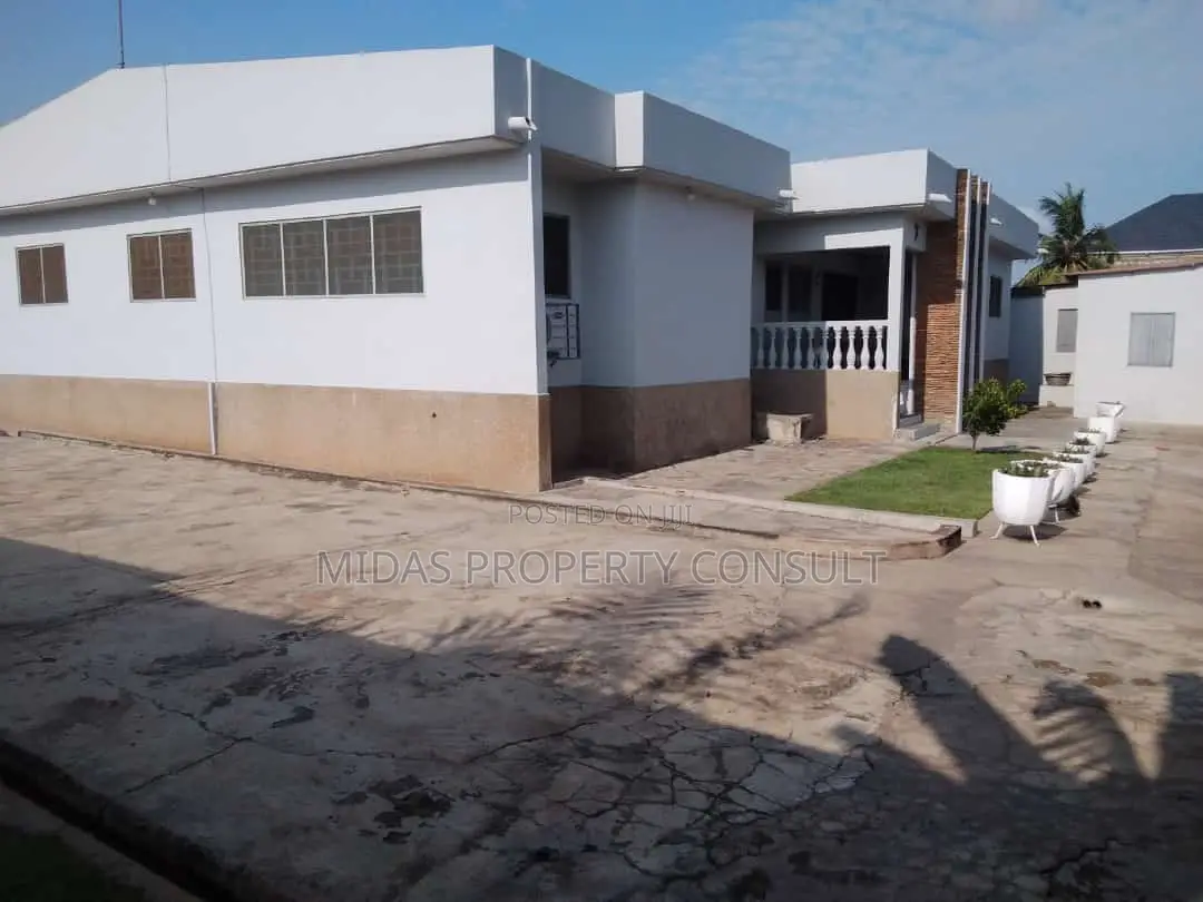 98x100ft Land With a House for Sale at Adenta Village