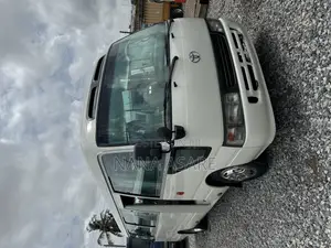 Toyota Coaster 2011 White