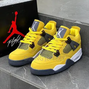 Photo - Original Nike Jordan 4 Yellow and Black