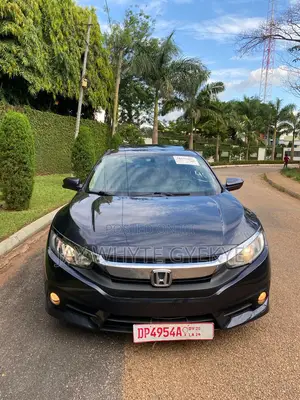 Photo - Honda Civic Touring 4dr Sedan (1.5L 4cyl) 2017 Black