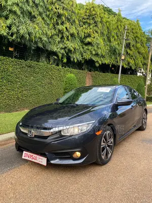 Photo - Honda Civic Touring 4dr Sedan (1.5L 4cyl) 2017 Black