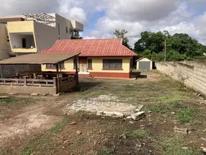 One Plot for Sale at Danyame Opposite Golden Tulip Hotel.
