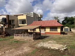 One Plot for Sale at Danyame Opposite Golden Tulip Hotel.