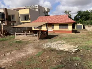 One Plot for Sale at Danyame Opposite Golden Tulip Hotel.