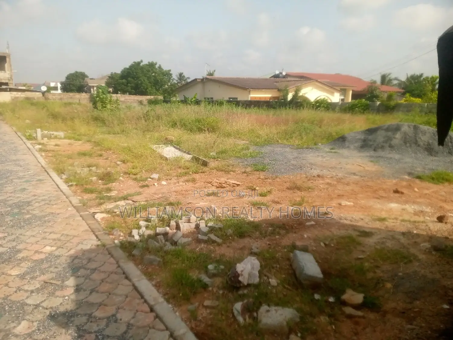 Titled Road Side Walled and Gated Land for Sale,Spintex
