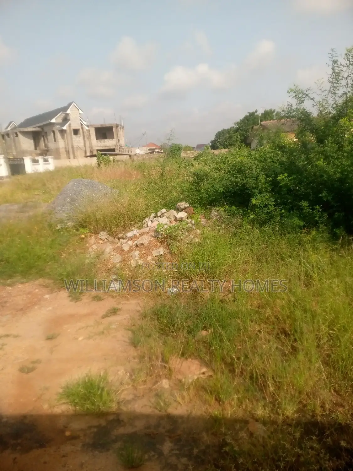 Titled Road Side Walled and Gated Land for Sale,Spintex