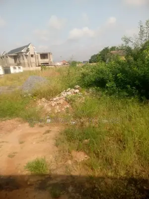 Titled Road Side Walled and Gated Land for Sale,Spintex