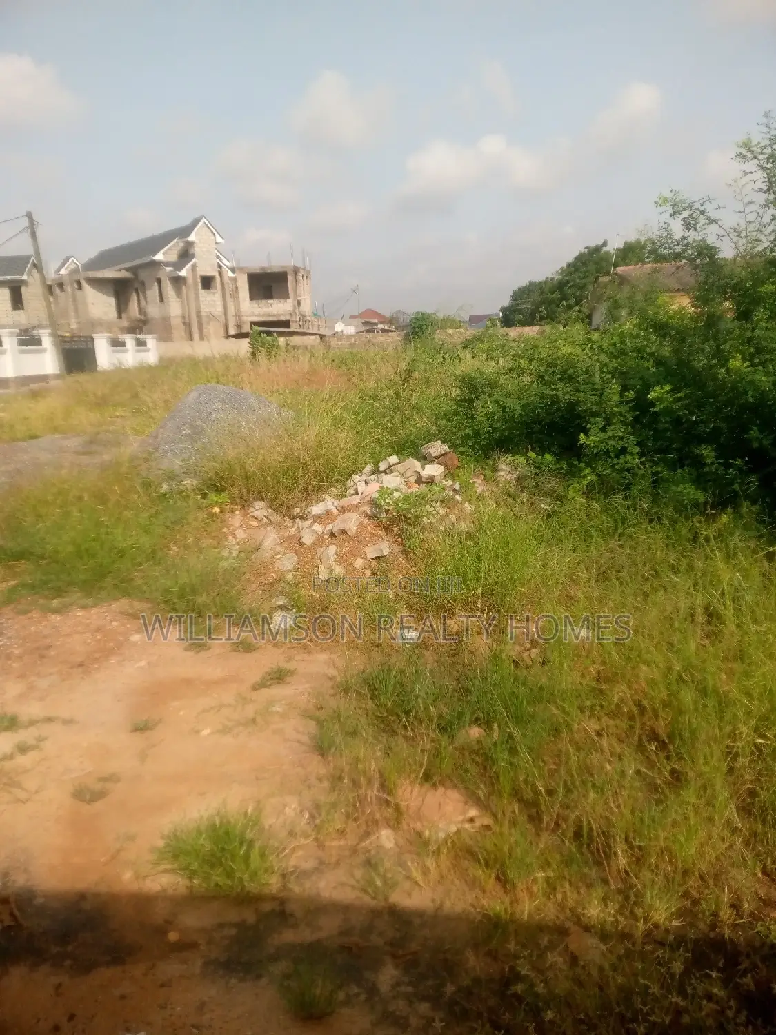 Titled Road Side Walled and Gated Land for Sale,Spintex