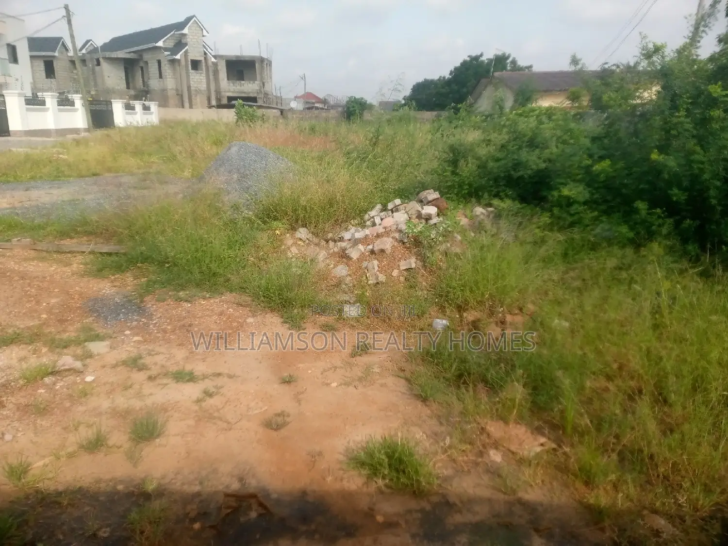 Titled Road Side Walled and Gated Land for Sale,Spintex