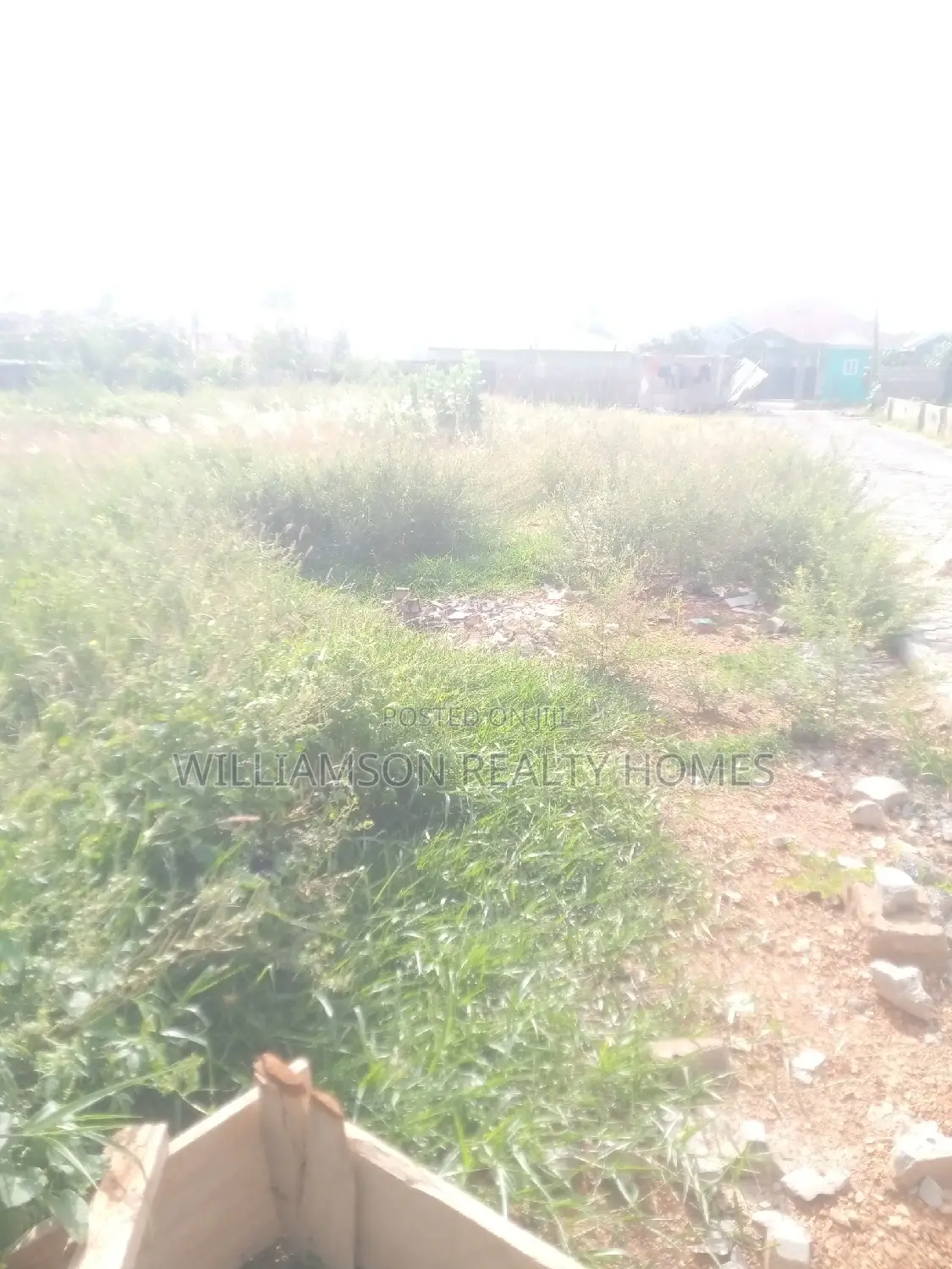 Titled Road Side Walled and Gated Land for Sale,Spintex