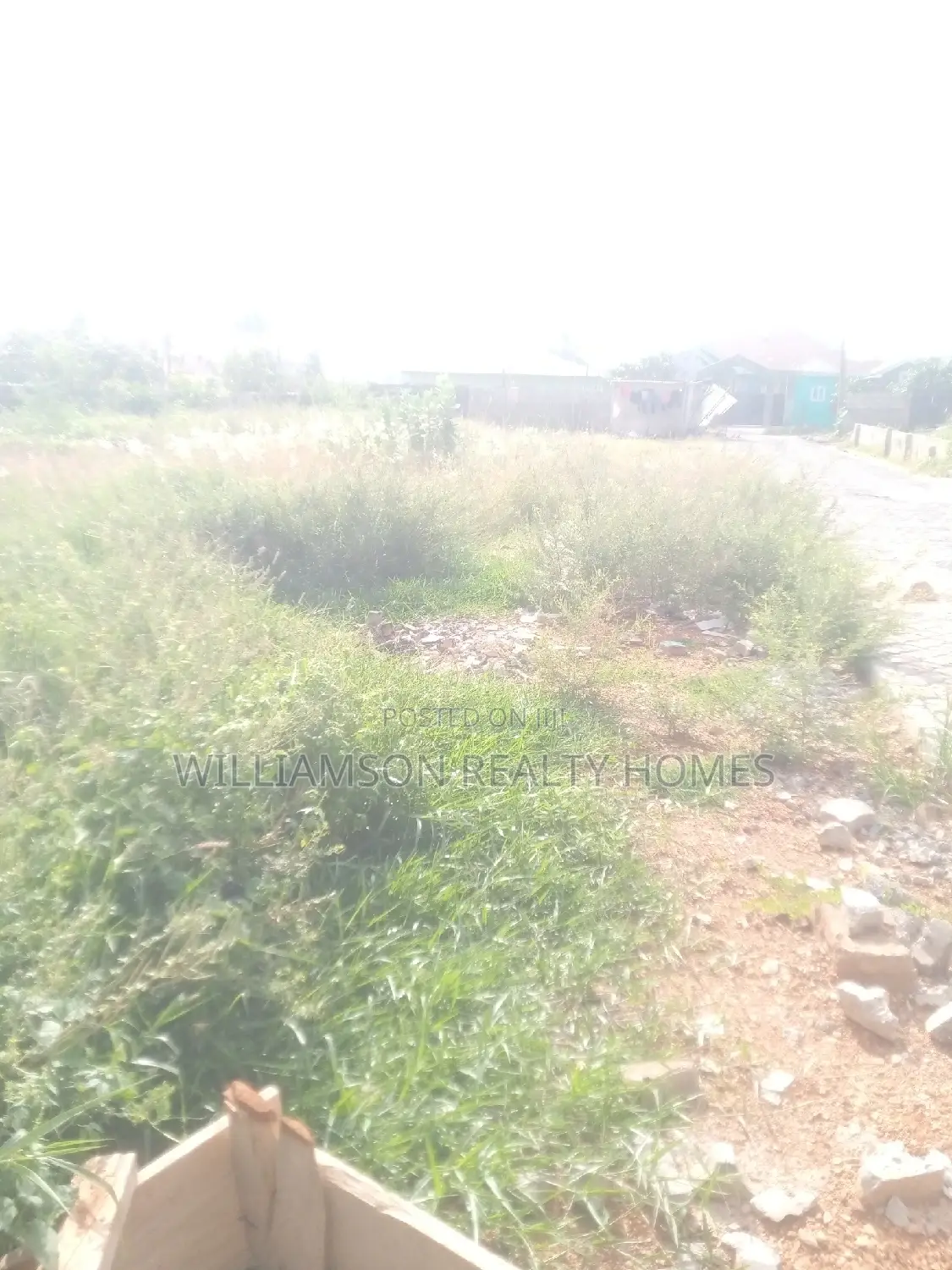 Titled Road Side Walled and Gated Land for Sale,Spintex