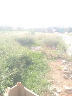 Titled Road Side Walled and Gated Land for Sale,Spintex
