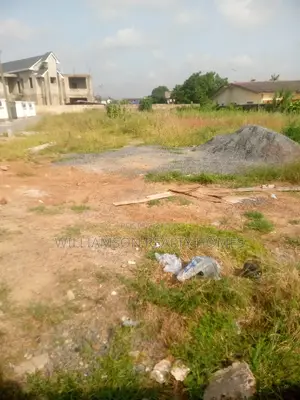 Titled Road Side Walled and Gated Land for Sale,Spintex
