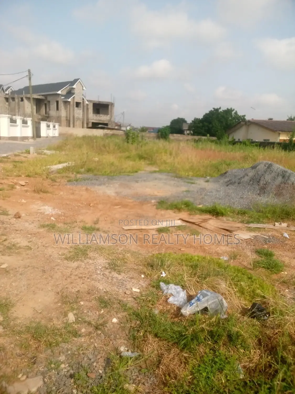 Titled Road Side Walled and Gated Land for Sale,Spintex