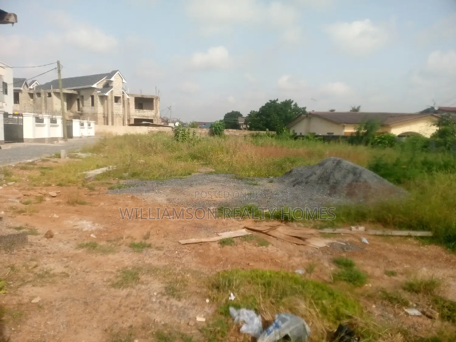 Titled Road Side Walled and Gated Land for Sale,Spintex