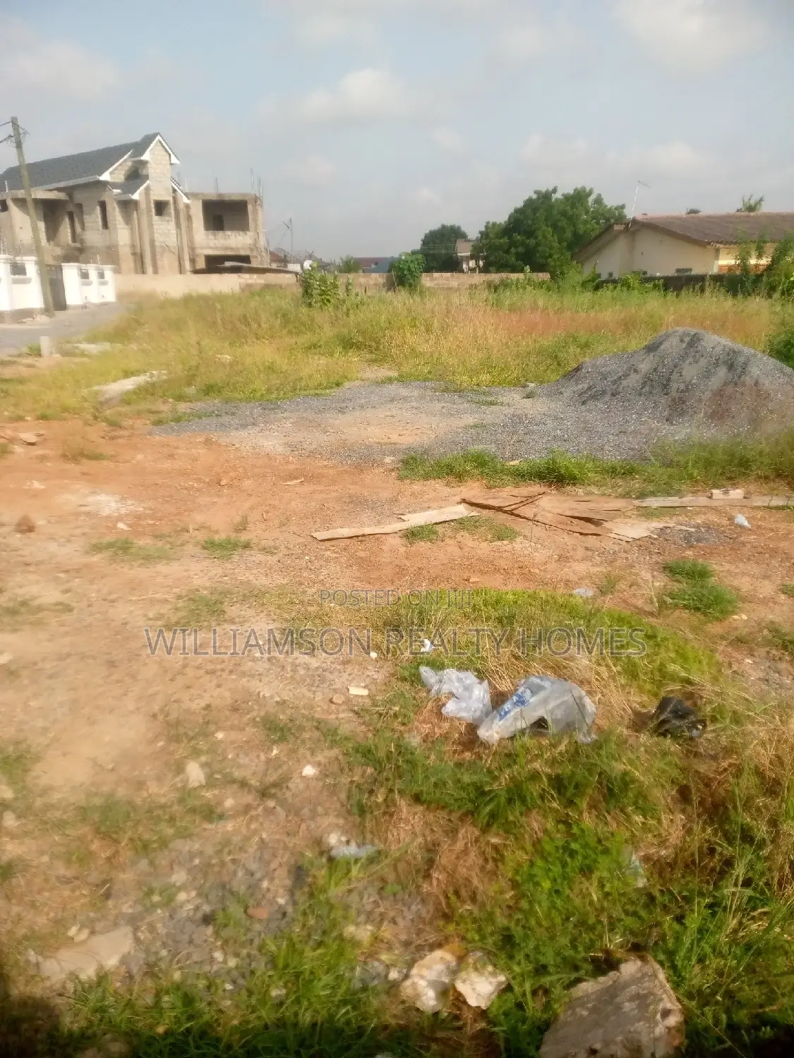 Titled Road Side Walled and Gated Land for Sale,Spintex