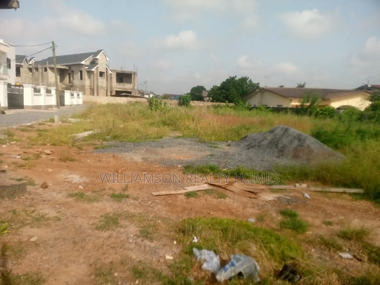 Titled Road Side Walled and Gated Land for Sale,Spintex