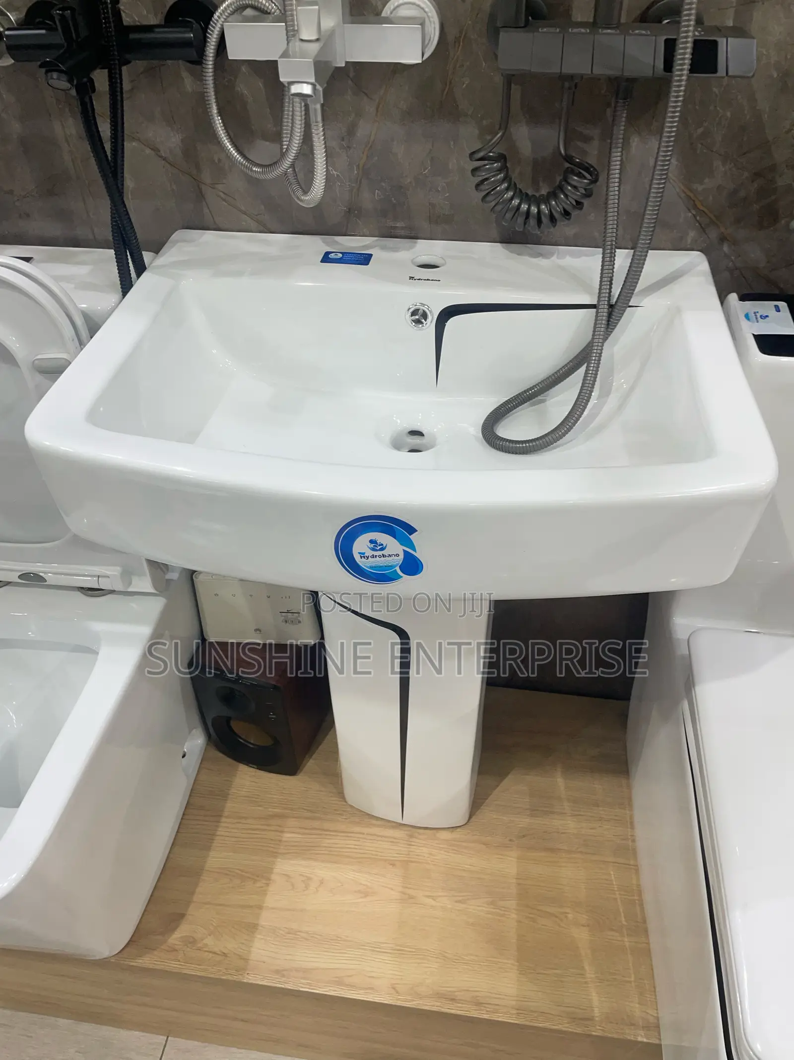Black and White Water Closet With Wash Hand Basin and Stand