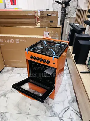 Newly Sealed Gas Orange 4burner 50/50 Volcano Oven.