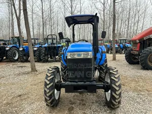 4wd New Holland Tractor With Plough and Harrow