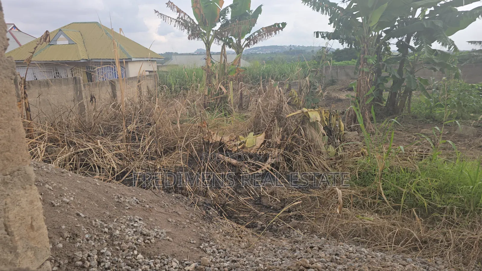 A Wall and Gated Land at Maase-Adubinso for Sale