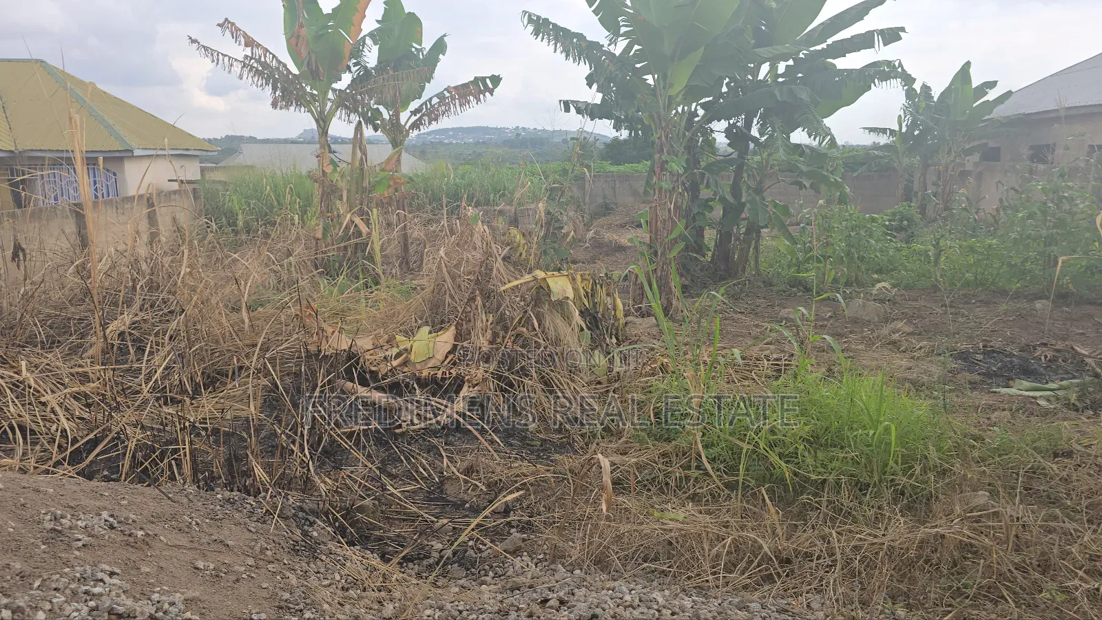 A Wall and Gated Land at Maase-Adubinso for Sale