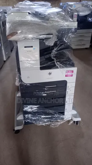 Hp M725. Black and White Copier