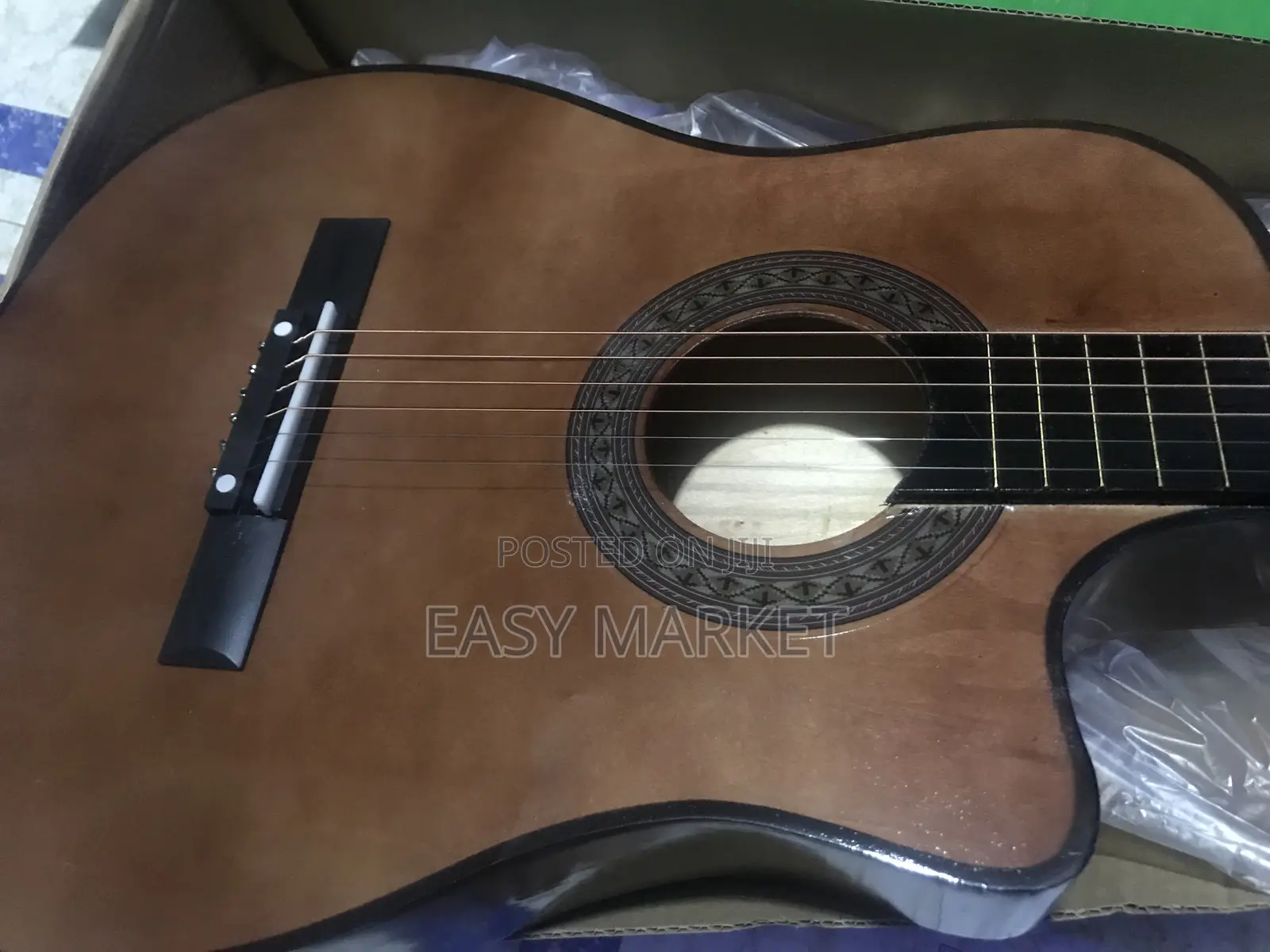 Brown Acoustic Guitar