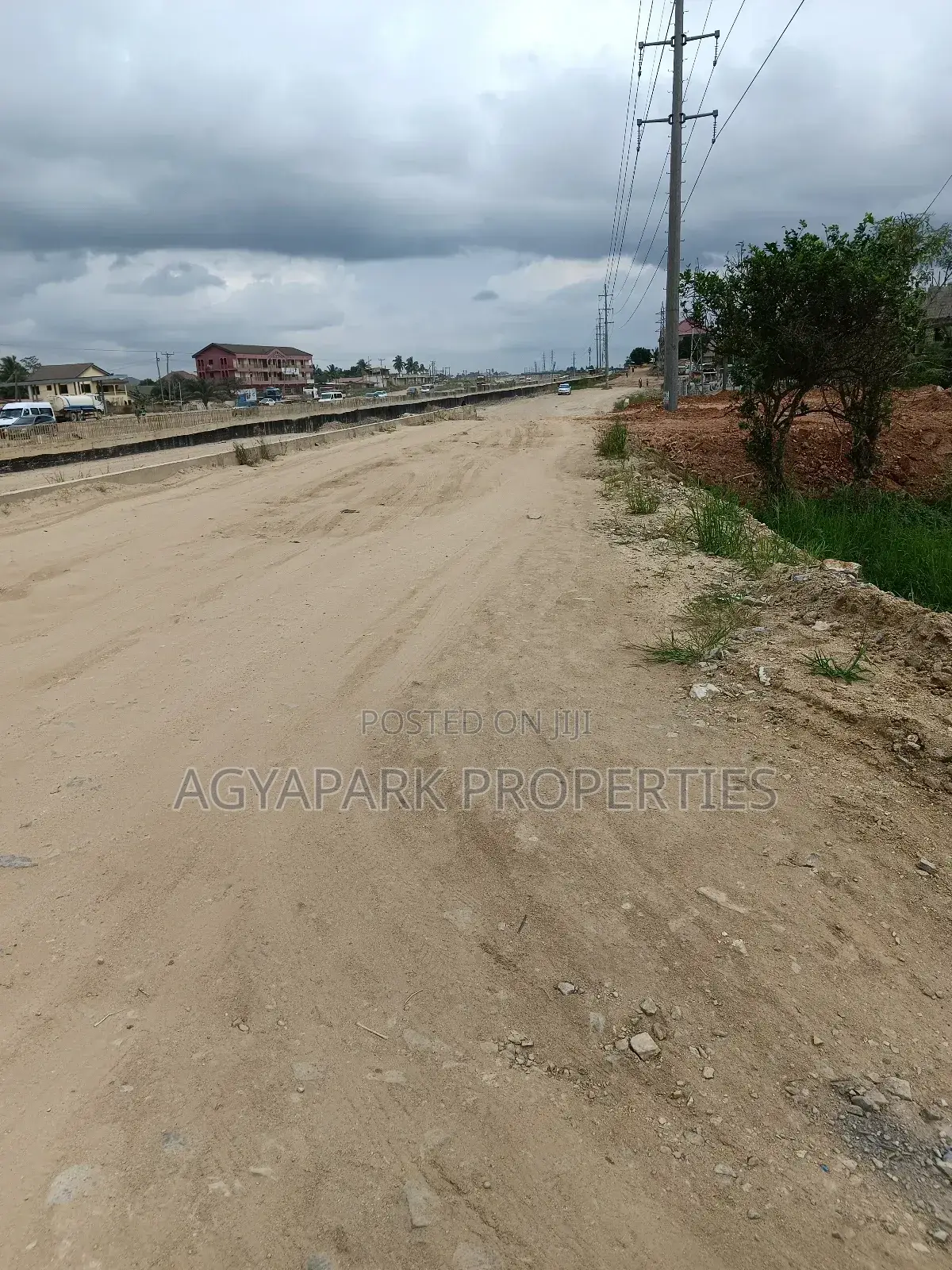 10 Plots of Title Land at Amasaman High Way ( Road Side)