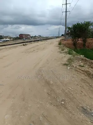 10 Plots of Title Land at Amasaman High Way ( Road Side)