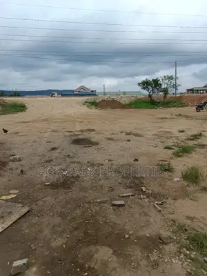 10 Plots of Title Land at Amasaman High Way ( Road Side)