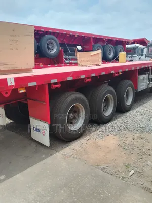 New Model Howo Trucks and Flatbed Trailers for Sale