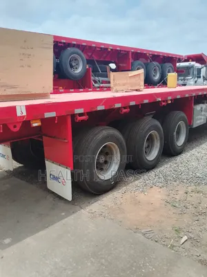 New Model Howo Trucks and Flatbed Trailers for Sale