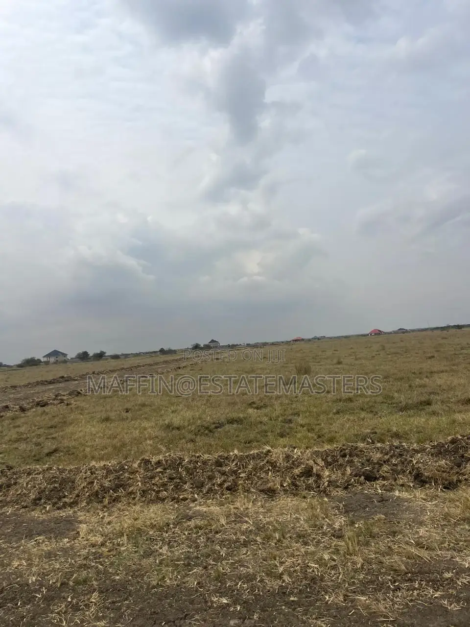 Land Between 2 Communities at Tsopoli for Sale