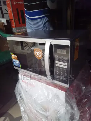 25L Bruhm Microwave With Defrost Settings