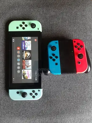 Nintendo Switch With Mk 1 Other Games and Accessories