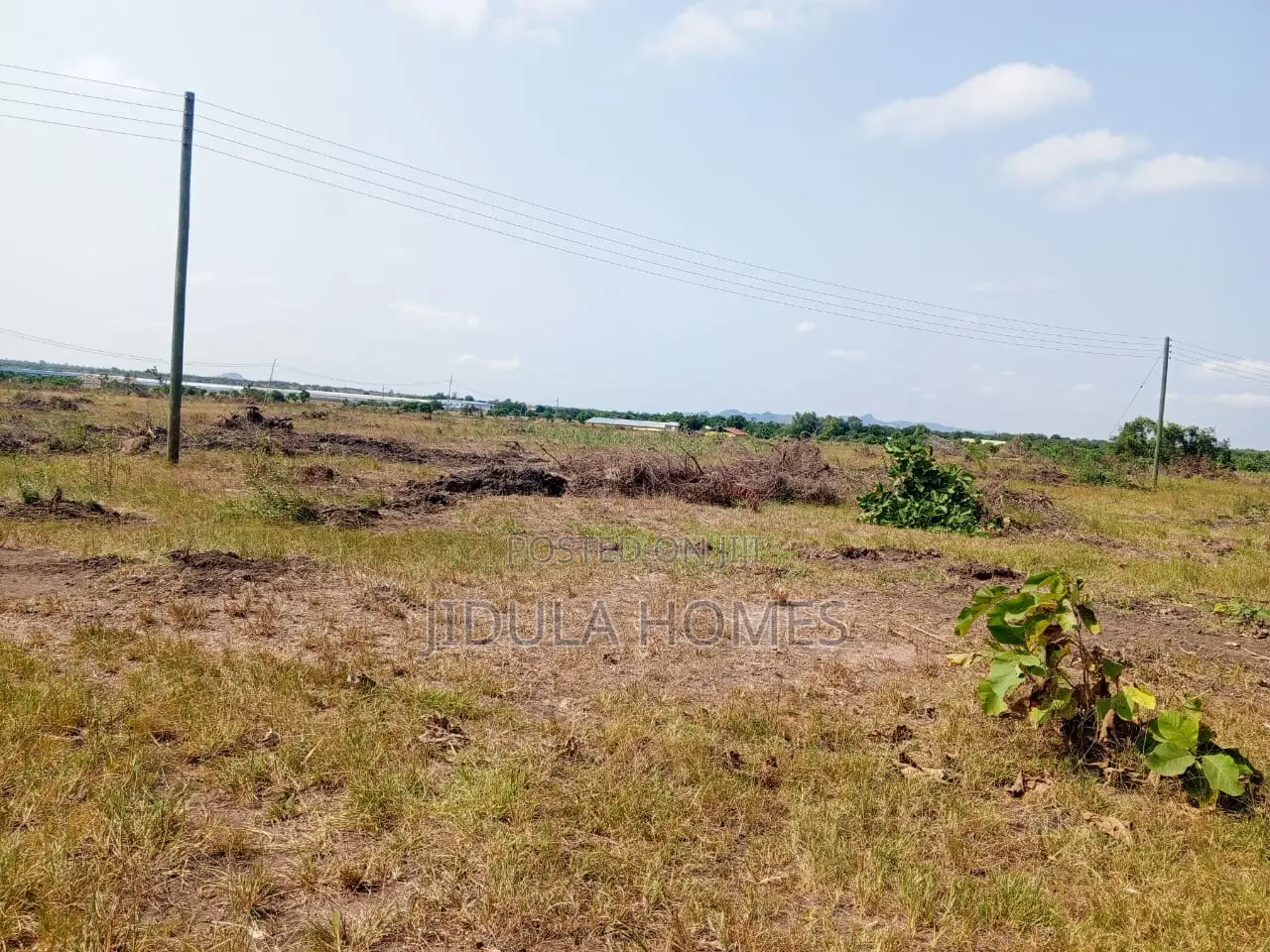 1 Plot 92 X 71 X 88 X 80 Land Titled / Registered