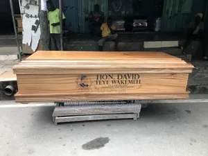 Original Kente Wood Casket With Glass on Top.Image at Side