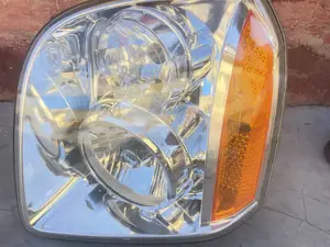 GMC Yukon Headlight 2014 Driver Side
