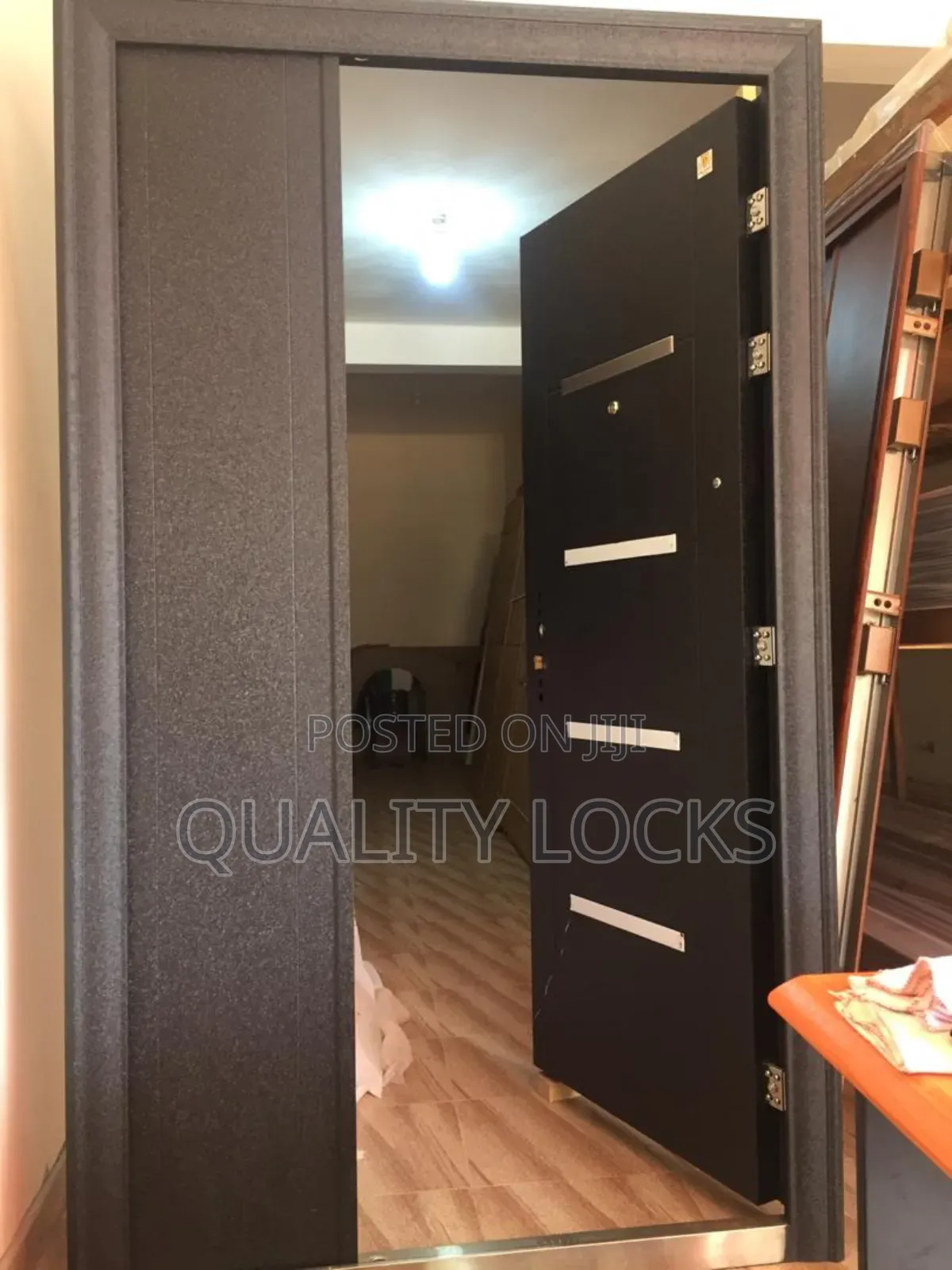 Silver and Black Metal Security Door