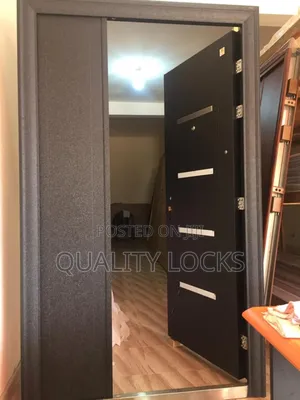 Silver and Black Metal Security Door