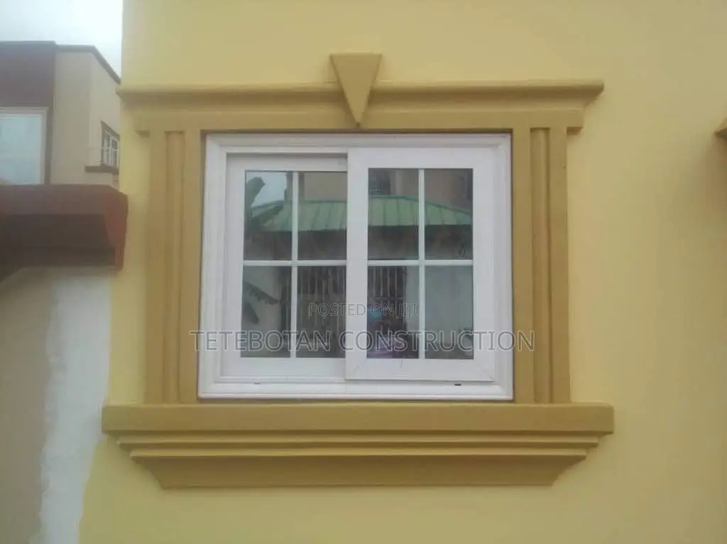 Window Design Decor Molding by Hand Using Mortar