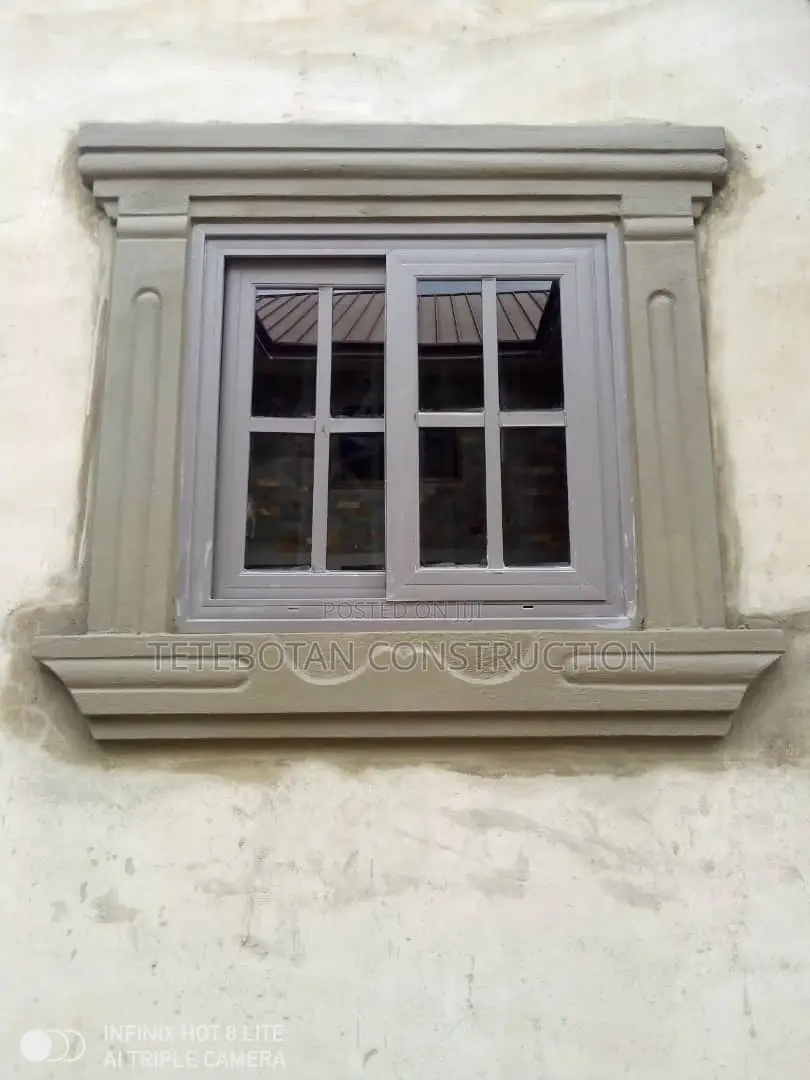 Window Design Decor Molding by Hand Using Mortar